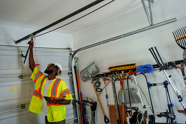 Professional Garage Door Panel Replacement technician working in Mattydale, NY